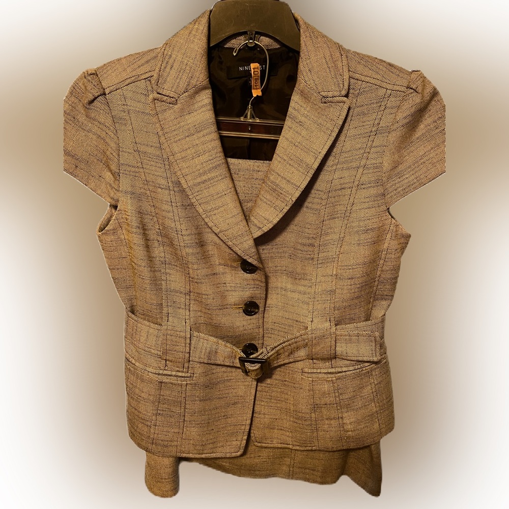 Excellent condition, tan two piece suit, no stains or scratches